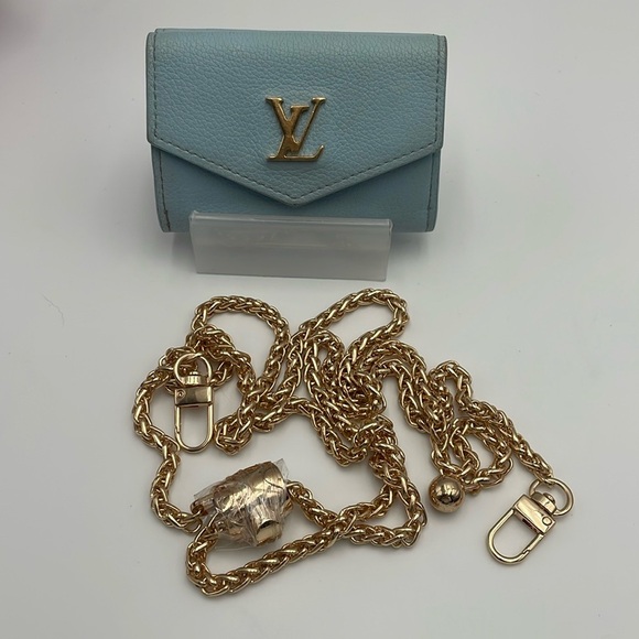 Louis Vuitton Handbags - Louis Vuitton rare lock Light mini Blue Wallet
